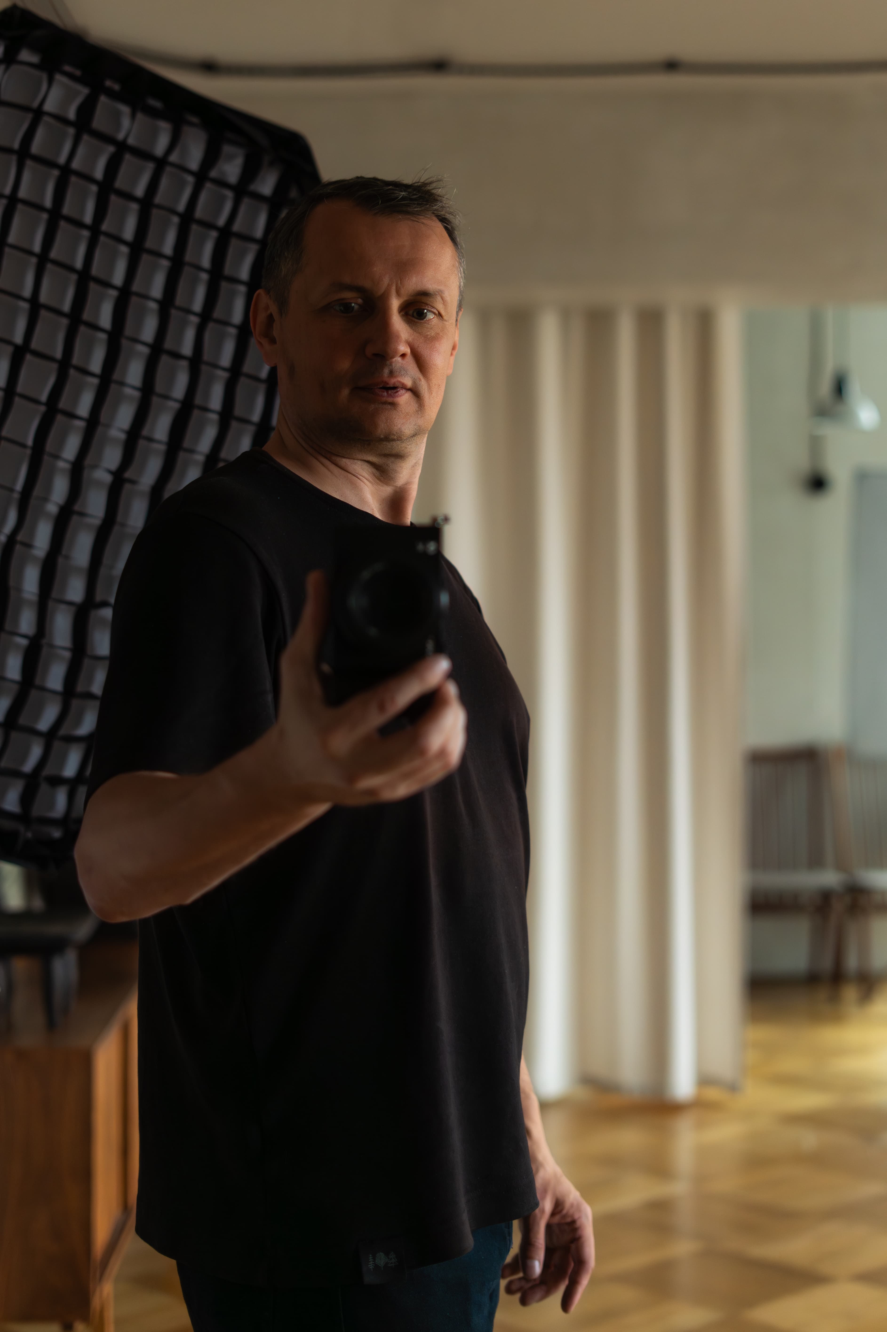 Vadim Petrov working with a camera on location